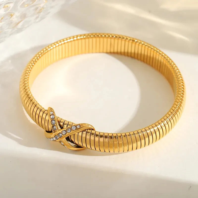 Gold-Plated Spring Bracelet American Diamond Knot Design Bangle