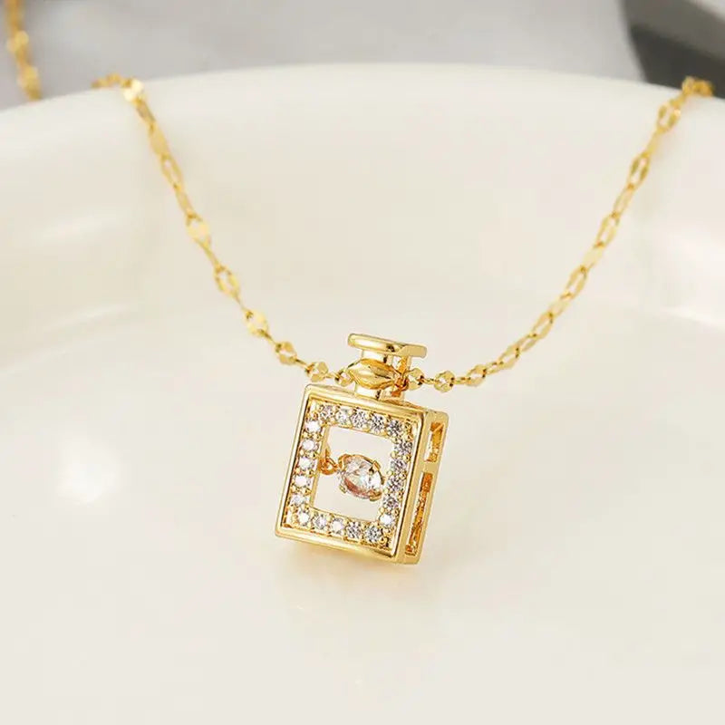 Golden Perfume Bottle Dancing Diamond Pendant Necklace