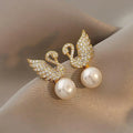 Golden Swan Pearl Stud Earrings, Crystal Stone Studded Shiny Bird Earrings For Women, Korean Jewellery