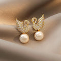 Golden Swan Pearl Stud Earrings, Crystal Stone Studded Shiny Bird Earrings For Women, Korean Jewellery