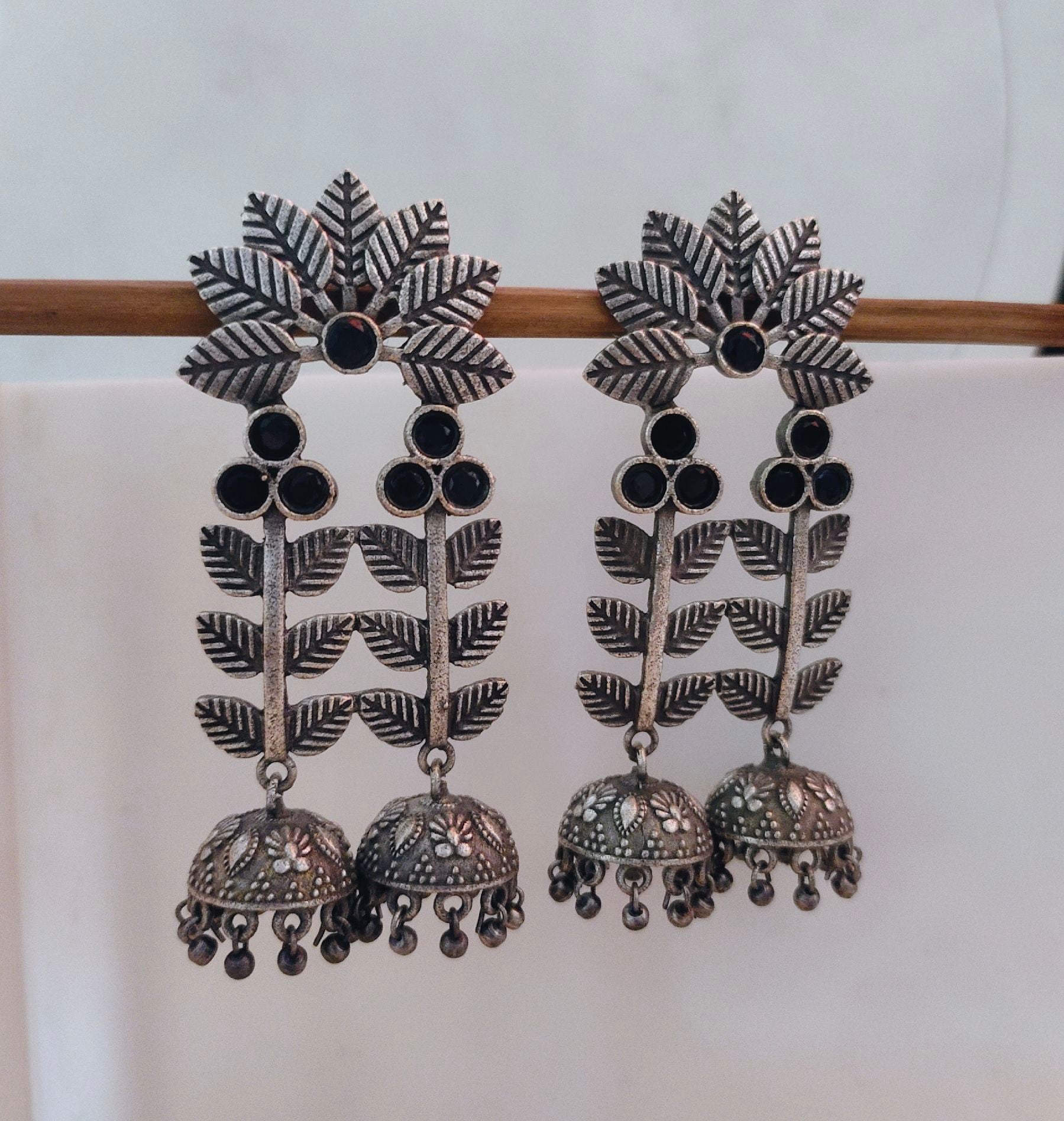 Leaf Style Jhumka Earrings, Silver Lookalike Black Stone Studded Dangle Earrings (MDYJ1065)