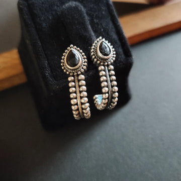 Silver-Plated Black Stone-Studded Oxidised Stud Earrings