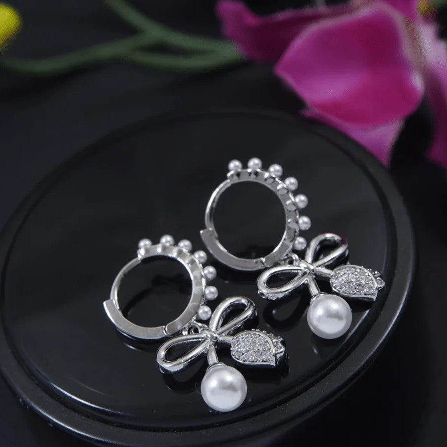 Silver-Plated Bowknot Design Pearl Studded Drop Earrings