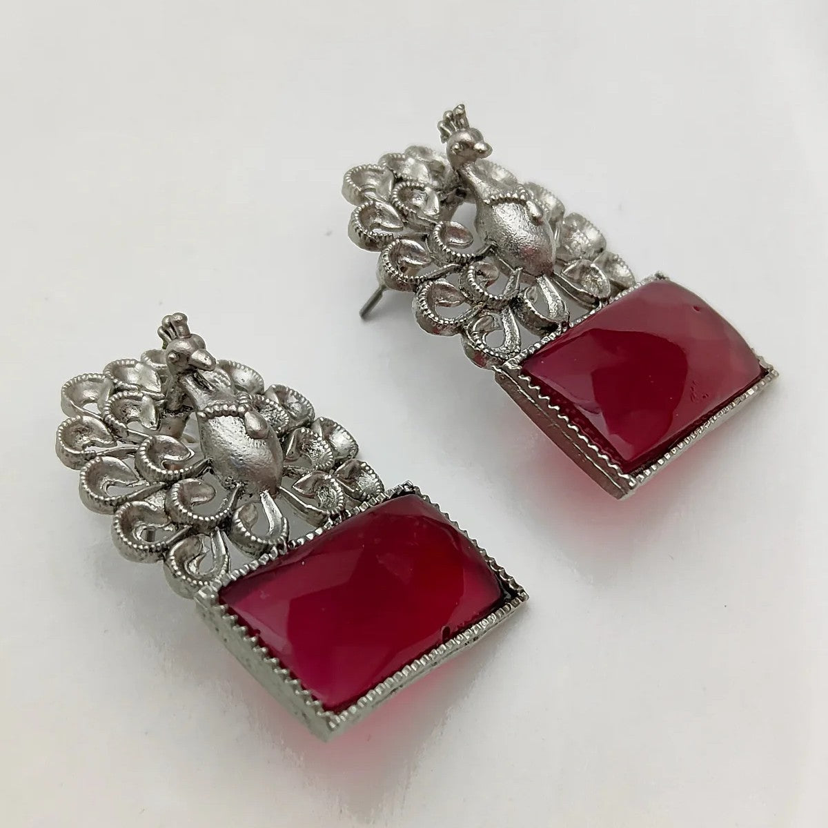 Silver-Plated Peacock Motif Ruby Stone Studded Earrings